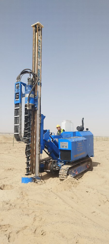 Anman AGL-460 drill working on solar micro-piles in Tibet desert